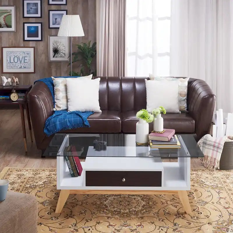 Moderner Couchtisch mit Glasplatte, Schublade und schrägen Beinen