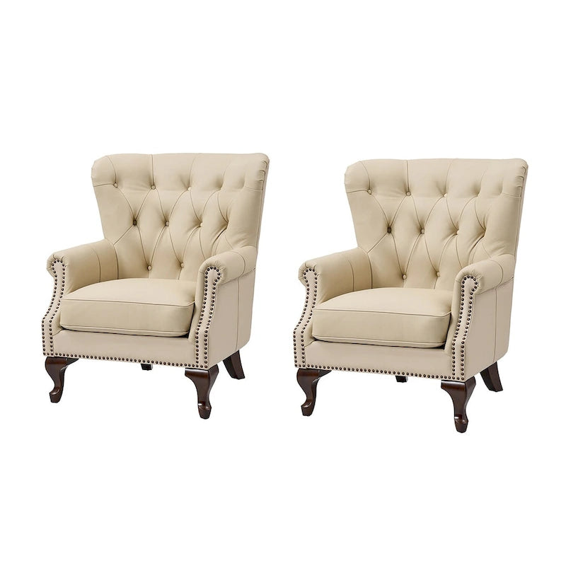 Poltrona trapuntata con schienale alto e borchie decorative, cuscino di seduta rimovibile