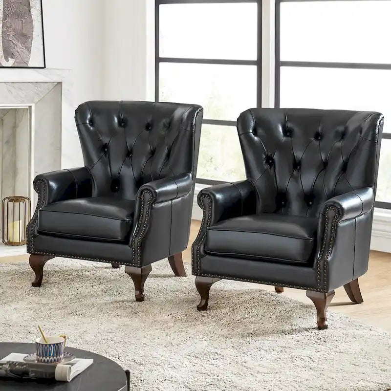 Poltrona trapuntata con schienale alto e borchie decorative, cuscino di seduta rimovibile