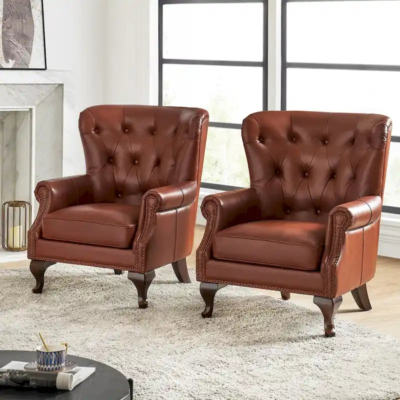 Poltrona trapuntata con schienale alto e borchie decorative, cuscino di seduta rimovibile
